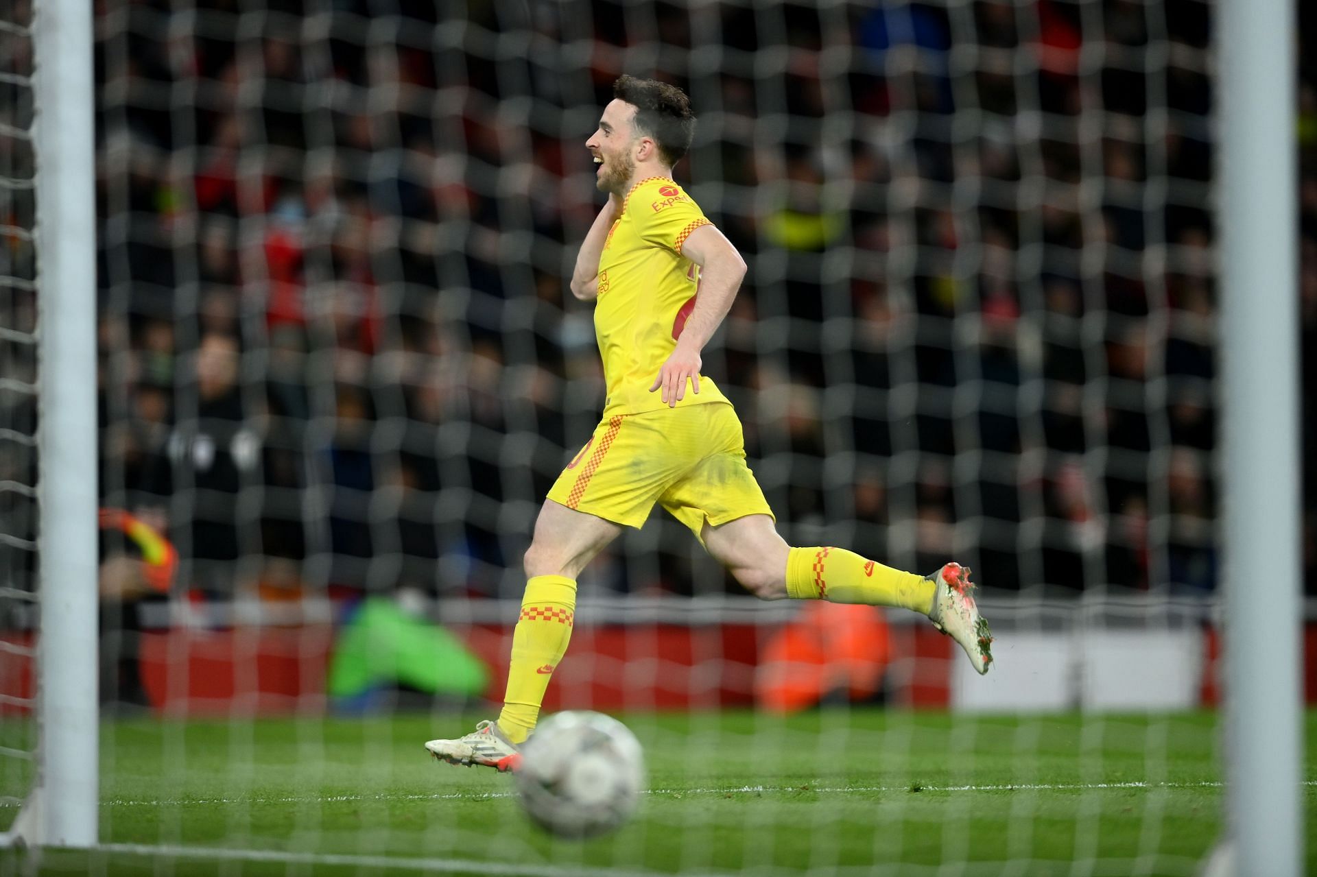 Liverpool's Diogo Jota rejoices after scoring against Arsenal.